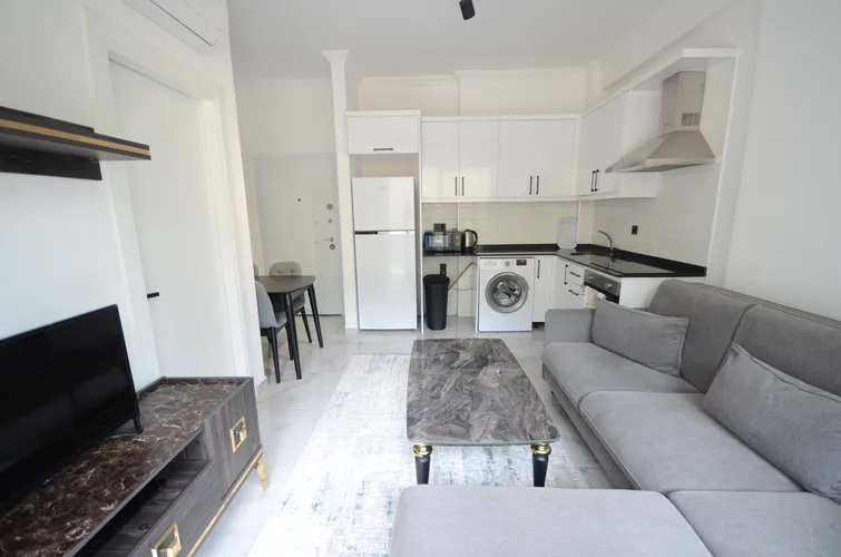 1+1 FURNISHED APARTMENT FOR SALE IN A NEW BUILDING IN ALANYA AVSALLAR.