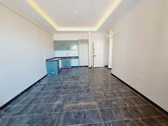 SPACIOUS 1+1 APARTMENT WITH SEA AND CITY VIEW IN MAHMUTLAR