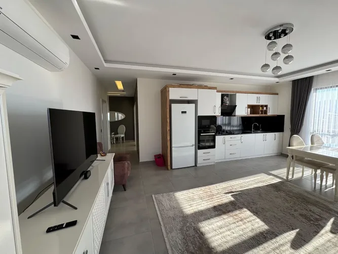 FURNISHED 2+1 APARTMENT WITH MOUNTAIN AND CITY VIEW IN LUXURY COMPLEX 