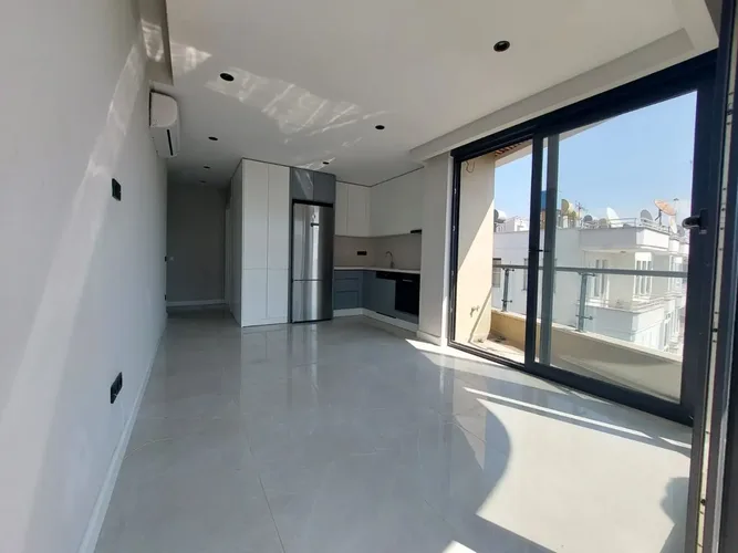 WHITE FURNISHED 1+1 APARTMENT FOR SALE NEAR ALANYA CENTER