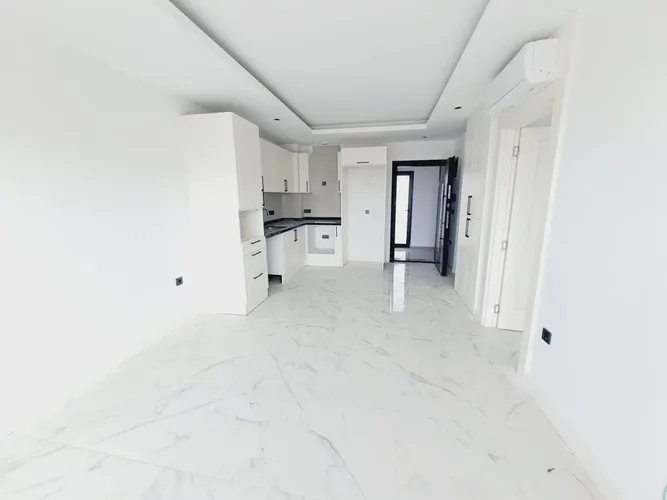 1+1 APARTMENT IN A NEW COMPLEX IN THE CENTER OF ALANYA
