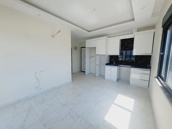  1+1 Apartment with City and Sea Views in the Payallar 