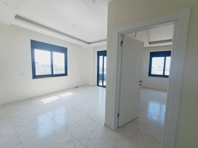  1+1 Apartment with City and Sea Views in the Payallar 