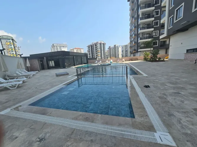 1+1 Apartment with Nature and City Views in Mahmutlar