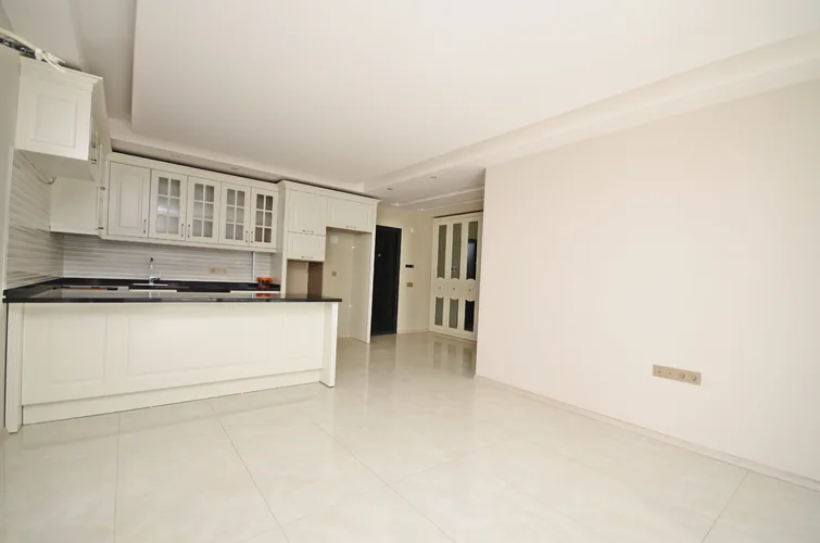 2+1 APARTMENT FOR SALE IN KARGICAK, WALKING DISTANCE TO THE SEA