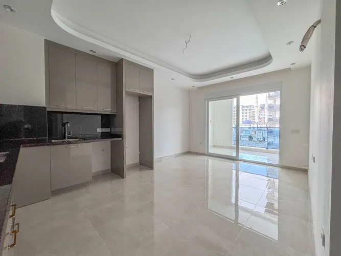 NEW 1+1 APARTMENT WITH FULL ACTIVITIES IN ALANYA MAHMUTLAR