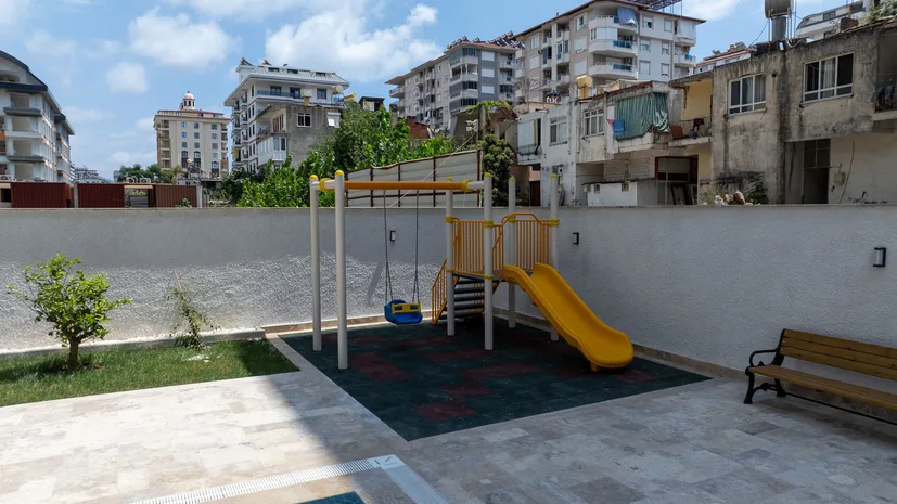FULLY FURNISHED 1+1 APARTMENT FOR SALE IN A NEW BUILDING IN MAHMUTLAR