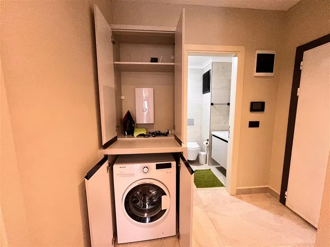 FULLY FURNISHED 1+1 APARTMENT FOR SALE IN A NEW BUILDING IN MAHMUTLAR