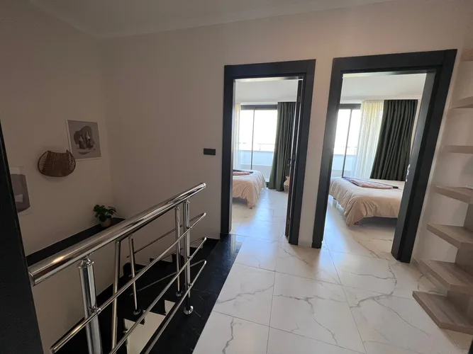 2+1 DUPLEX APARTMENT WITH MOUNTAIN AND SEA VIEWS IN MAHMUTLAR, FURNISH