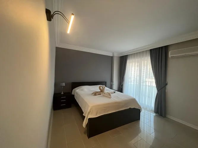 2+1 FURNISHED APARTMENT WITH A UNIQUE CITY VIEW IN ALANYA CİKCİLLİ
