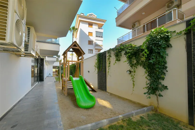 LUXURY FURNISHED 1+1 APARTMENT RIGHT ON THE BEACH IN TOSMUR, ALANYA.