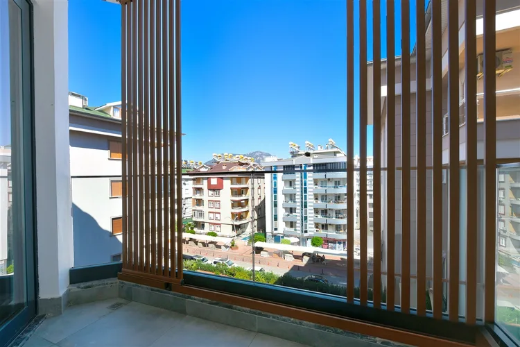 LUXURY FURNISHED 1+1 APARTMENT RIGHT ON THE BEACH IN TOSMUR, ALANYA.