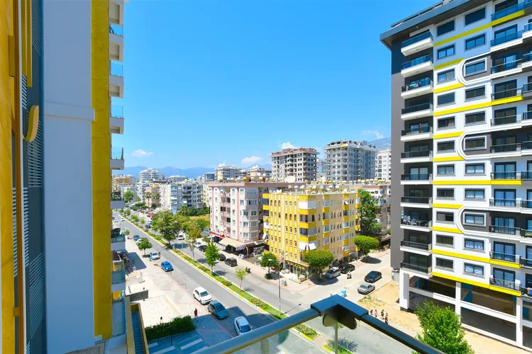 LUXURY 1+1 APARTMENT RIGHT ON THE BEACH IN ALANYA MAHMUTLAR.