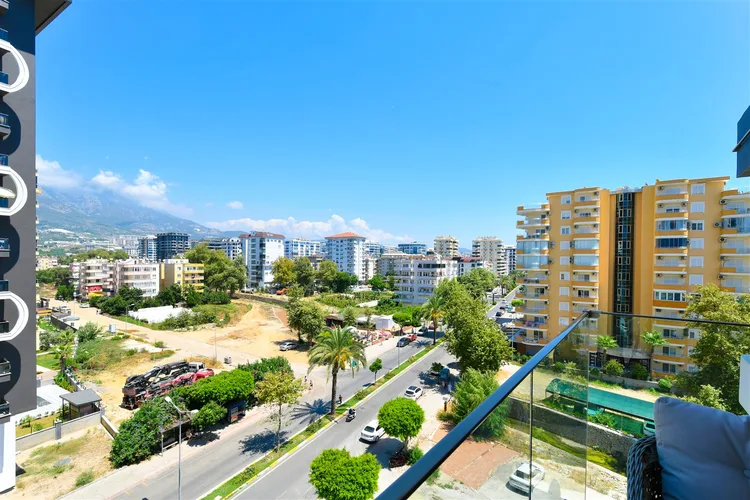 LUXURY 1+1 APARTMENT RIGHT ON THE BEACH IN ALANYA MAHMUTLAR.