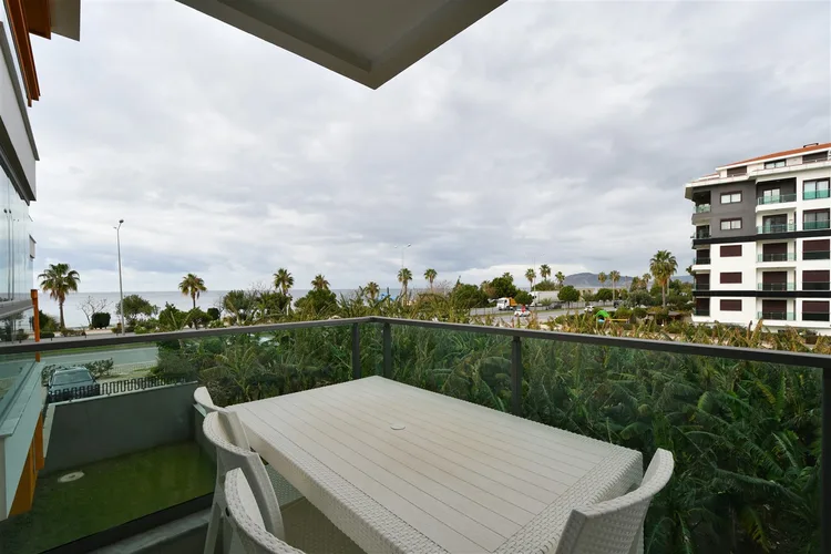 1+1 FURNISHED APARTMENT RIGHT ON THE BEACH IN ALANYA KESTEL.