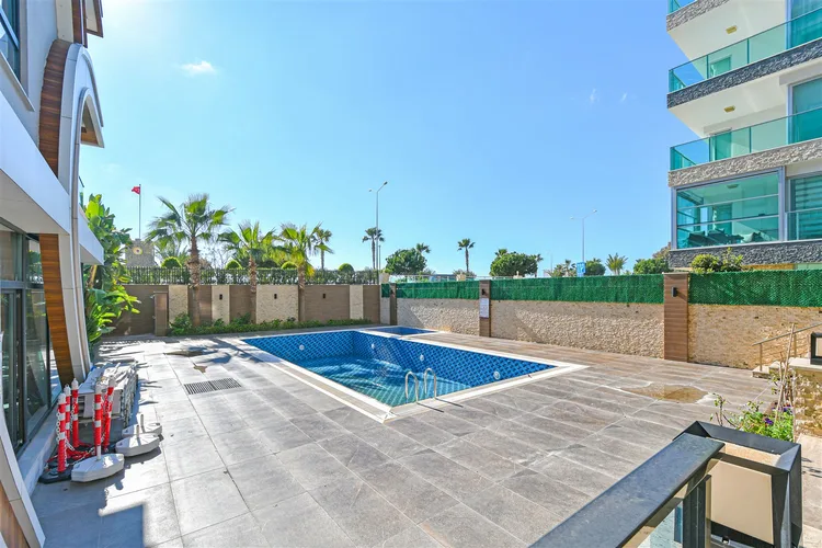 SPACIOUS 1+1 FURNISHED APARTMENT RIGHT ON THE BEACH IN ALANYA KESTEL.