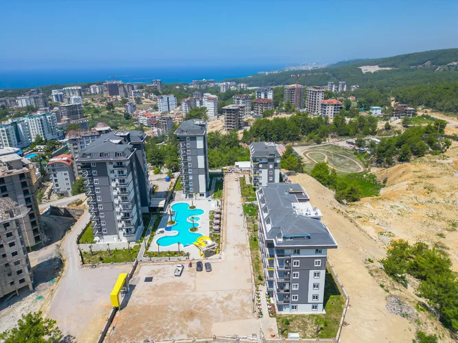 1+1 APARTMENT IN A GATED COMMUNITY IN ALANYA AVSALLAR.