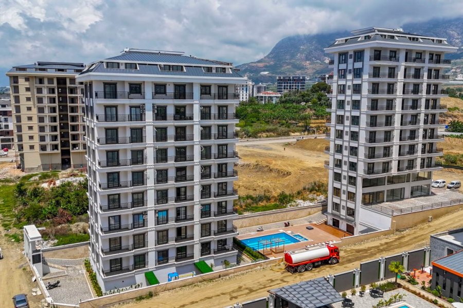НОВАЯ КВАРТИРА 1+1 В ЦЕНТРЕ МАХМУТЛАРА, АЛАНЬЯ