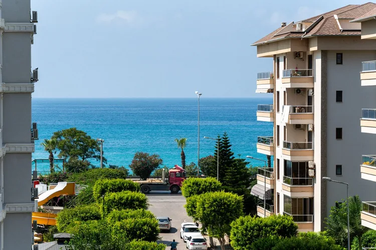 2+1 APARTMENT WITHIN WALKING DISTANCE TO THE SEA IN ALANYA TOSMUR