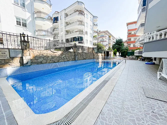 FURNISHED 2+1 APARTMENT WITHIN WALKING DISTANCE TO THE SEA IN ALANYA OBA