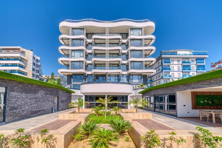 LUXURY 1+1 APARTMENT DIRECTLY BY THE SEA IN ALANYA KARGICAK