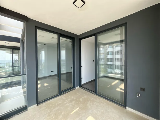 LUXURY 1+1 APARTMENT DIRECTLY BY THE SEA IN ALANYA KARGICAK