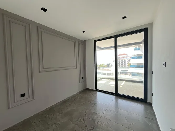LUXURY 1+1 APARTMENT DIRECTLY BY THE SEA IN ALANYA KARGICAK