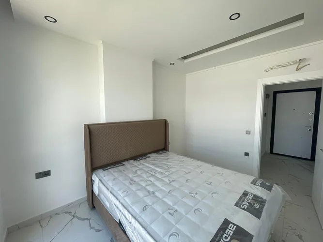 1+1 MOUNTAIN VIEW APARTMENT IN A FULL ACTIVITY COMPLEX IN ALANYA AVSALLAR