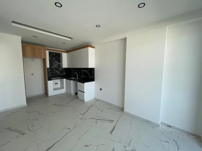 1+1 MOUNTAIN VIEW APARTMENT IN A FULL ACTIVITY COMPLEX IN ALANYA AVSALLAR