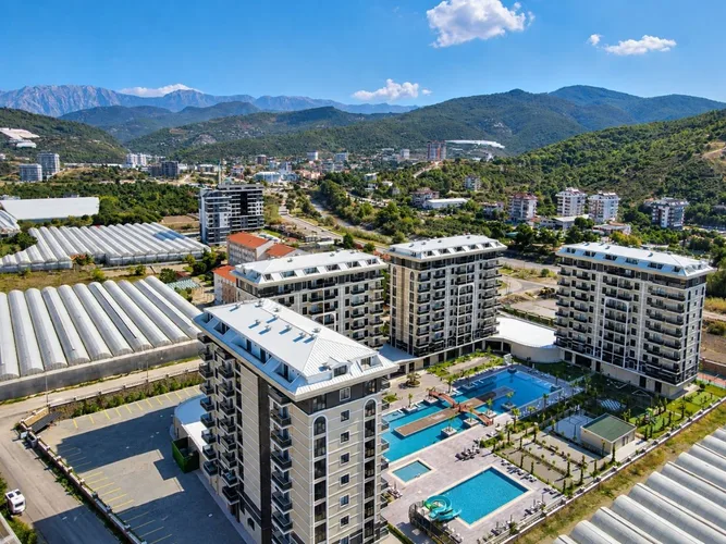 Элитная квартира на продажу в жилом комплексе Exodus Riverside, Аланья, Exterior - 1