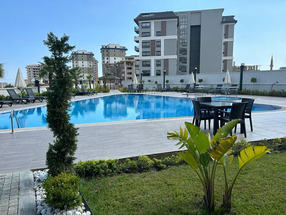 Furnished 1+1 apartment with garden in Avsallar 