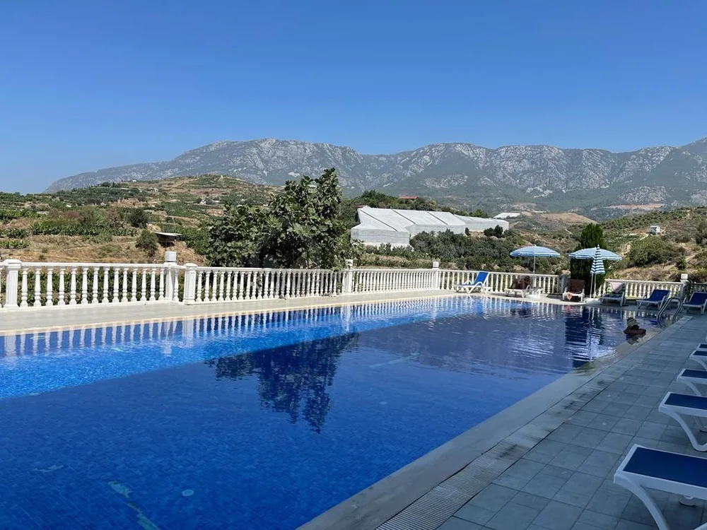 Furnished 1+0 apartment with panoramic mountain and sea view in Kargicak 