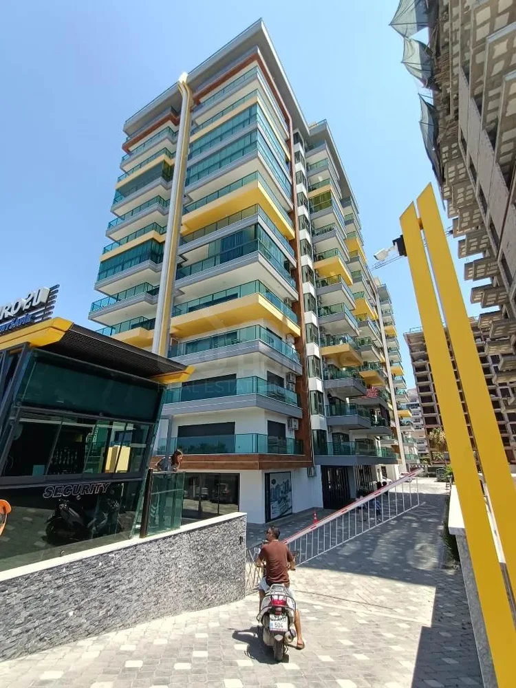 Unfurnished 1+1 apartment close to the sea in Kargicak 
