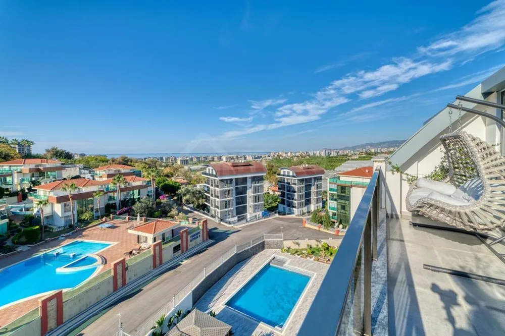 SEA NATURE Furnished 2+1 duplex with a sea view in Kargicak 