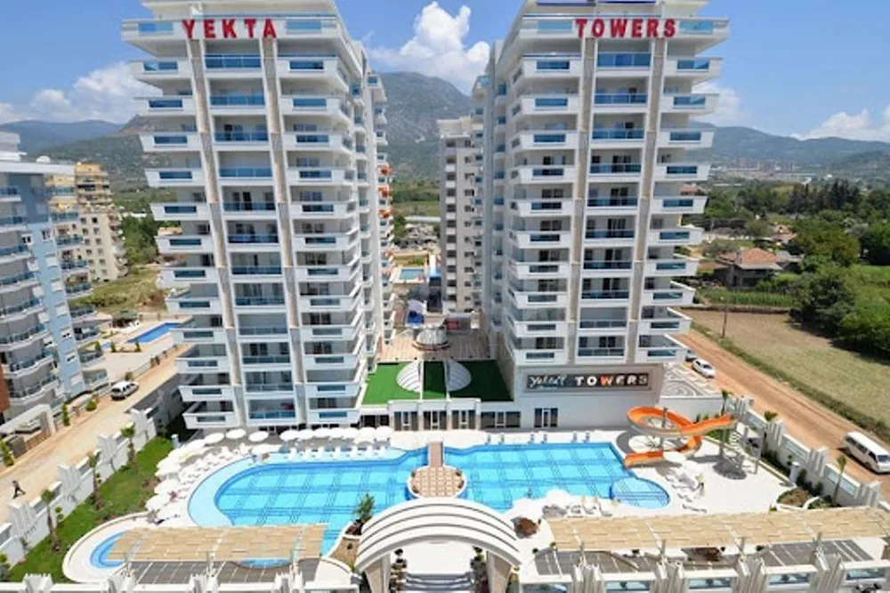 YEKTA TOWERS Furnished 2+1 apartment close to the sea in Mahmutlar 