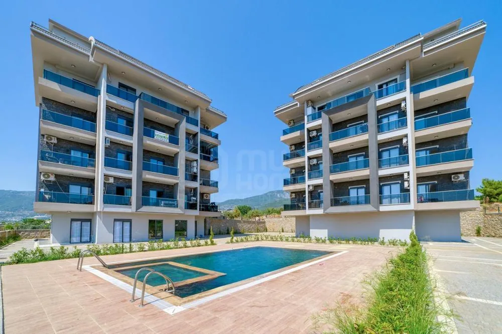 PARADİSE GARDEN 1 Furnished 2+1 apartment with a sea view in Oba 