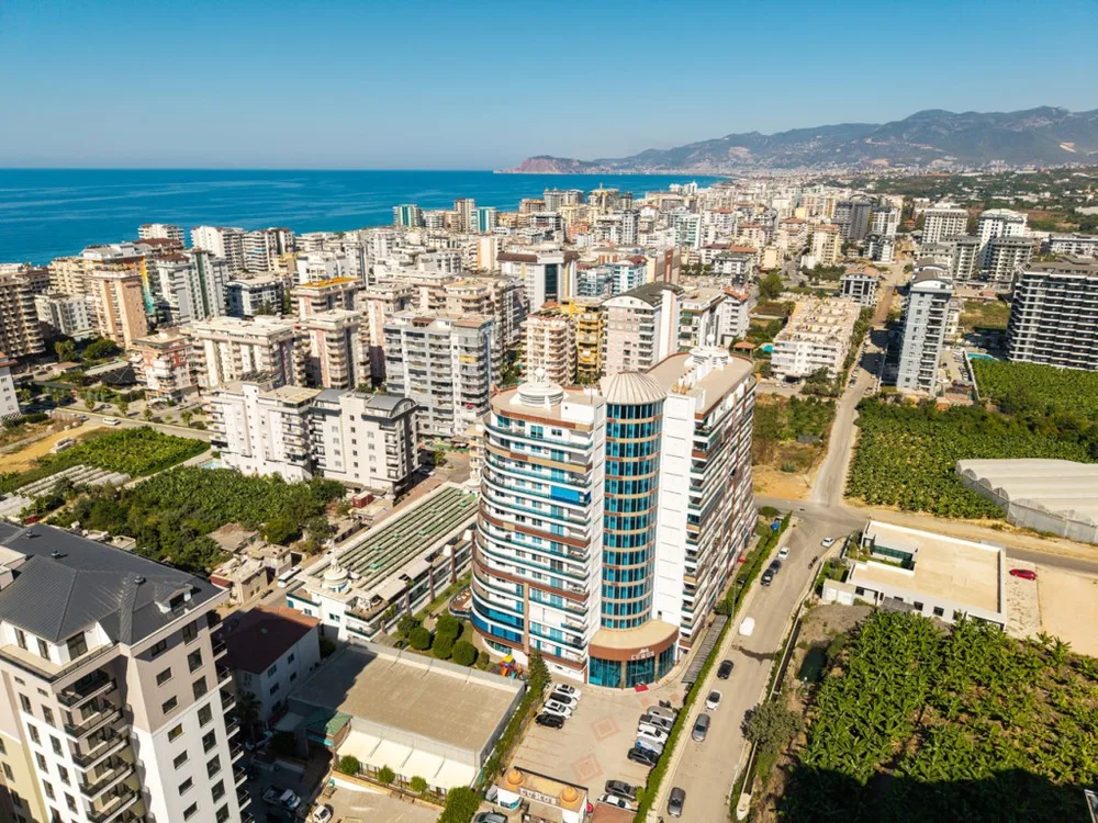 LUMOS Furnished 3+1 apartment with a sea view in Mahmutlar 