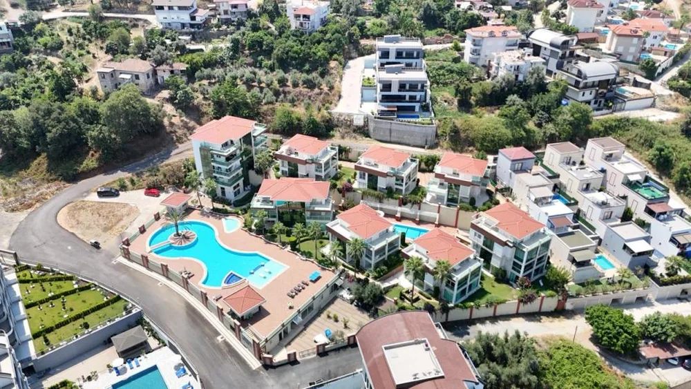 YÜKSEK 3 Furnished 4+1 duplex with a sea view in Kargicak 
