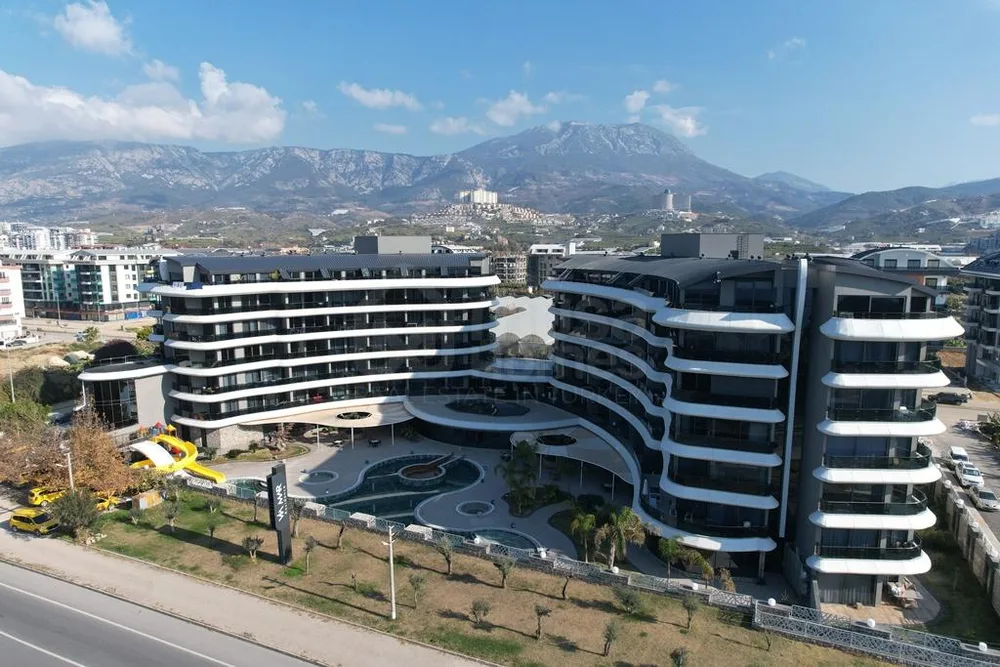 VİA MAR RESİDENCE Furnished 2+1 apartment in front of the sea in Kargicak 