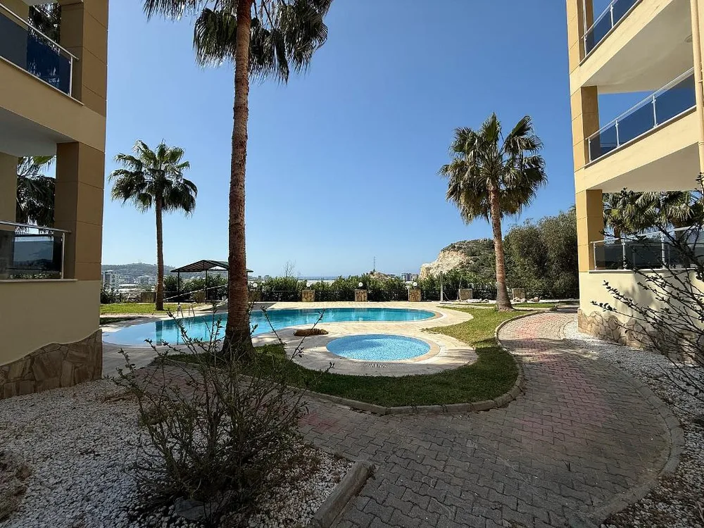 PARADISE RESIDENCE Furnished 4+1 duplex with a sea view in Demirtas 