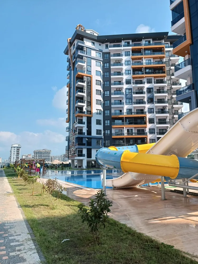 TEKINOĞLU Furnished 1+1 apartment in Mahmutlar
