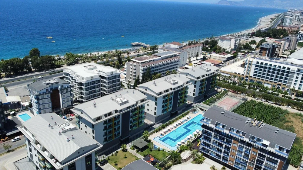 KONAK TERRACE HOMES Furnished 1+1 apartment close to the sea in Kargıcak